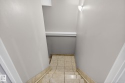 Corridor with light tile patterned floors - 