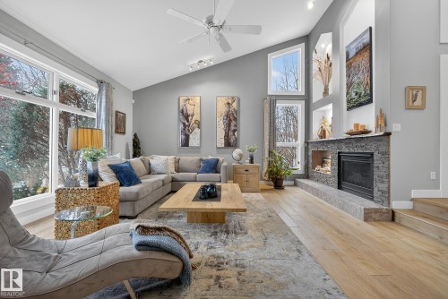 113 53226 Rge Road 261, Rural Parkland County, AB - Indoor Photo Showing Living Room With Fireplace