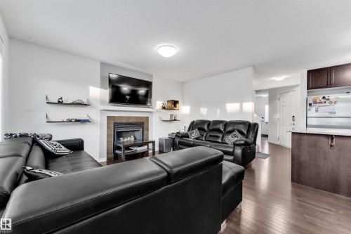 3722 9 Street, Edmonton, AB - Indoor Photo Showing Living Room With Fireplace