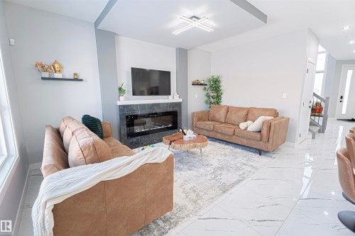 1524 17 Avenue, Edmonton, AB - Indoor Photo Showing Living Room With Fireplace