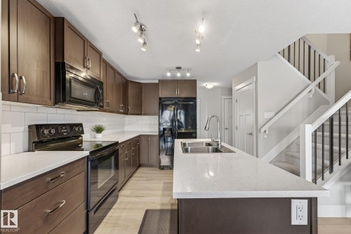 17604 8 Avenue, Edmonton, AB - Indoor Photo Showing Kitchen With Double Sink