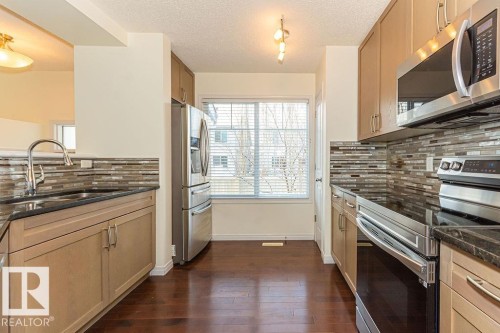 24 1140 Chappelle Boulevard, Edmonton, AB - Indoor Photo Showing Kitchen With Double Sink With Upgraded Kitchen