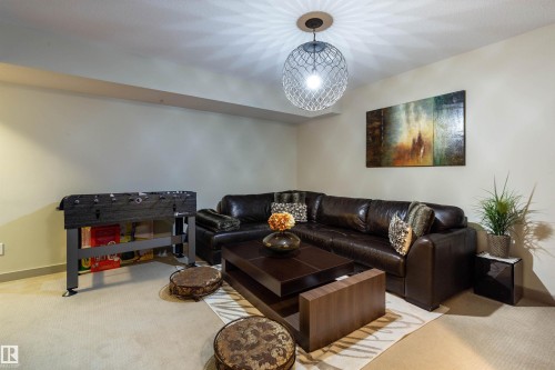 52 1150 Windermere Way, Edmonton, AB - Indoor Photo Showing Living Room