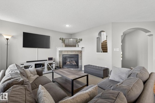 1147 Rutherford Close, Edmonton, AB - Indoor Photo Showing Living Room With Fireplace