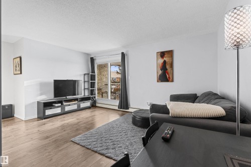 74 11245 31 Avenue, Edmonton, AB - Indoor Photo Showing Living Room