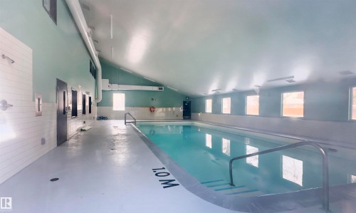 74 11245 31 Avenue, Edmonton, AB - Indoor Photo Showing Other Room With In Ground Pool