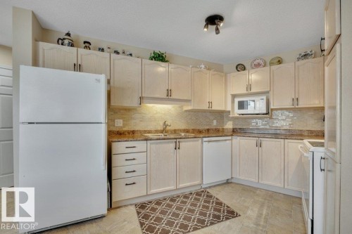 25 603 Youville Drive E, Edmonton, AB - Indoor Photo Showing Kitchen