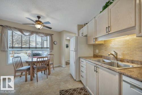 25 603 Youville Drive E, Edmonton, AB - Indoor Photo Showing Kitchen With Double Sink