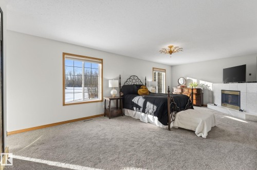 47 Willow Springs Crescent, Sylvan Lake, AB - Indoor With Fireplace