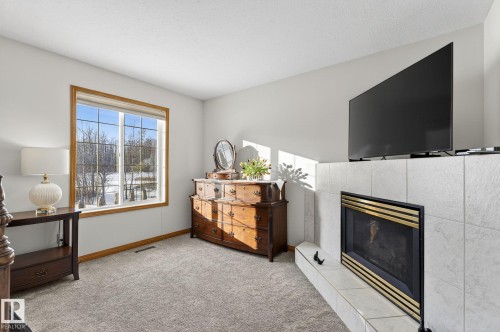 47 Willow Springs Crescent, Sylvan Lake, AB - Indoor Photo Showing Living Room With Fireplace