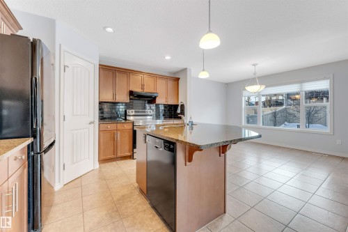 Edmonton, AB - Indoor Photo Showing Kitchen