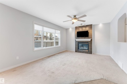 6723 19 Avenue, Edmonton, AB - Indoor Photo Showing Living Room With Fireplace