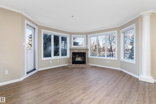203 10610 76 Street, Edmonton, AB - Indoor Photo Showing Living Room With Fireplace