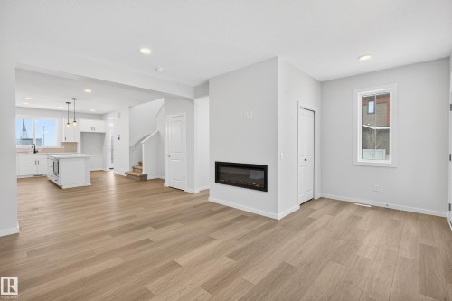 17203 3 Street, Edmonton, AB - Indoor Photo Showing Other Room With Fireplace