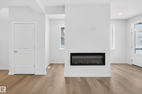 17203 3 Street, Edmonton, AB - Indoor Photo Showing Living Room With Fireplace