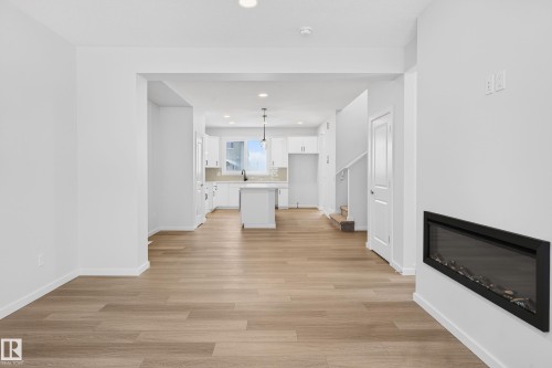 17203 3 Street, Edmonton, AB - Indoor Photo Showing Other Room With Fireplace