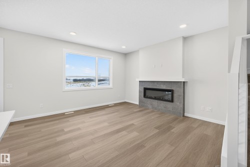 17427 3 Street, Edmonton, AB - Indoor Photo Showing Living Room With Fireplace