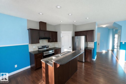 2825 16A Avenue, Edmonton, AB - Indoor Photo Showing Kitchen With Double Sink