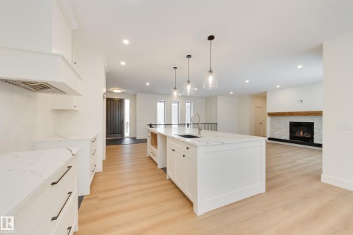 6 54514 Rge Road 12, Rural Lac Ste. Anne County, AB - Indoor Photo Showing Kitchen With Fireplace