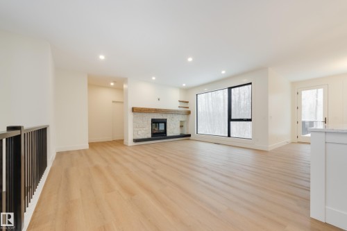 6 54514 Rge Road 12, Rural Lac Ste. Anne County, AB - Indoor Photo Showing Living Room With Fireplace