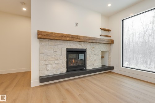 6 54514 Rge Road 12, Rural Lac Ste. Anne County, AB - Indoor Photo Showing Living Room With Fireplace