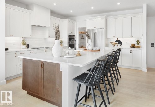 111 Stiles Bend, Leduc, AB - Indoor Photo Showing Kitchen With Upgraded Kitchen