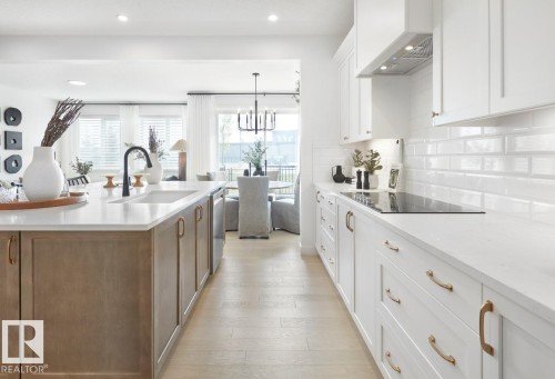 111 Stiles Bend, Leduc, AB - Indoor Photo Showing Kitchen With Upgraded Kitchen