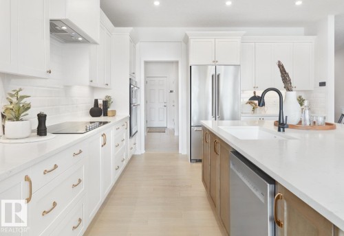111 Stiles Bend, Leduc, AB - Indoor Photo Showing Kitchen With Upgraded Kitchen