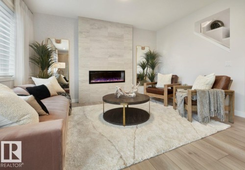 3247 Dixon Way, Edmonton, AB - Indoor Photo Showing Living Room With Fireplace