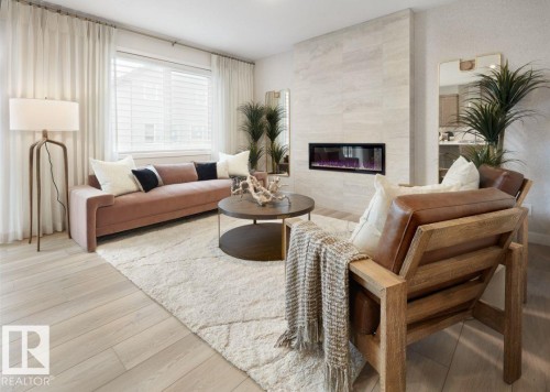3247 Dixon Way, Edmonton, AB - Indoor Photo Showing Living Room With Fireplace