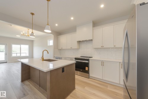 199 Stonehouse Way, Leduc, AB - Indoor Photo Showing Kitchen With Upgraded Kitchen