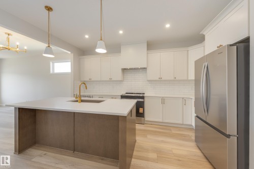 199 Stonehouse Way, Leduc, AB - Indoor Photo Showing Kitchen With Upgraded Kitchen
