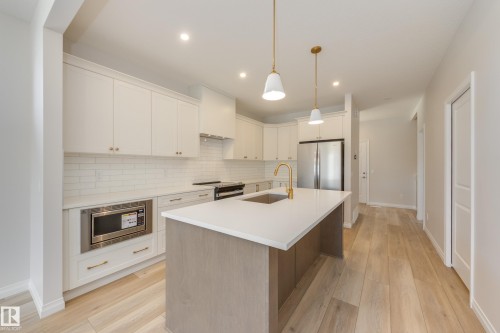 199 Stonehouse Way, Leduc, AB - Indoor Photo Showing Kitchen With Upgraded Kitchen