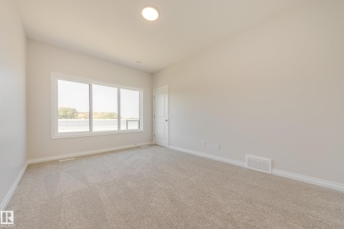 199 Stonehouse Way, Leduc, AB - Indoor Photo Showing Other Room