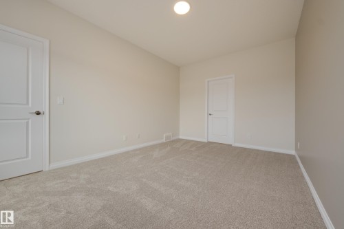 207 Stonehouse Way, Leduc, AB - Indoor Photo Showing Other Room