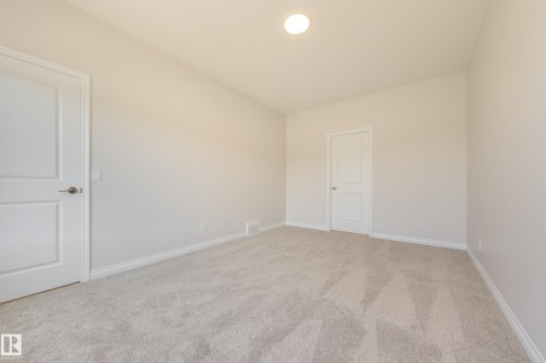 207 Stonehouse Way, Leduc, AB - Indoor Photo Showing Other Room