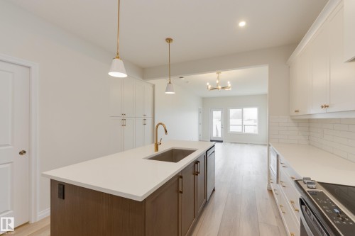 207 Stonehouse Way, Leduc, AB - Indoor Photo Showing Kitchen With Upgraded Kitchen