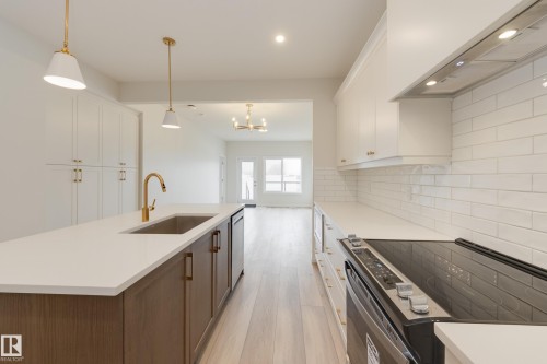 207 Stonehouse Way, Leduc, AB - Indoor Photo Showing Kitchen With Upgraded Kitchen