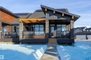 170 Stonehouse Way, Leduc, AB  - Outdoor With Deck Patio Veranda With Facade 