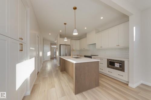 170 Stonehouse Way, Leduc, AB - Indoor Photo Showing Kitchen With Upgraded Kitchen