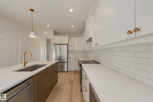 170 Stonehouse Way, Leduc, AB - Indoor Photo Showing Kitchen With Stainless Steel Kitchen With Upgraded Kitchen