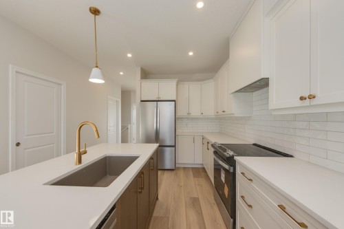 170 Stonehouse Way, Leduc, AB - Indoor Photo Showing Kitchen With Stainless Steel Kitchen With Upgraded Kitchen