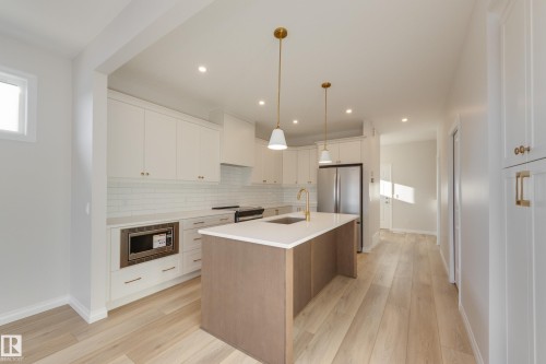196 Stonehouse Way, Leduc, AB - Indoor Photo Showing Kitchen With Stainless Steel Kitchen With Upgraded Kitchen