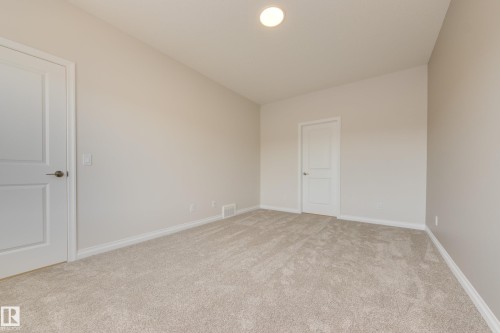 196 Stonehouse Way, Leduc, AB - Indoor Photo Showing Other Room