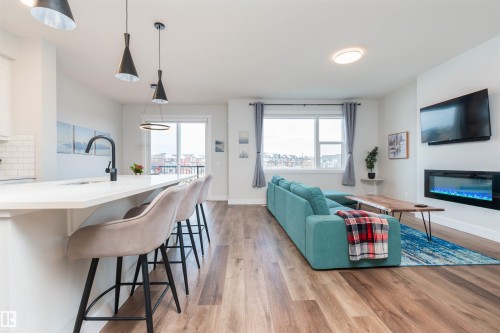 3805 Cherry Loop, Edmonton, AB - Indoor Photo Showing Living Room With Fireplace