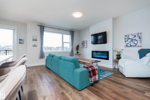 3805 Cherry Loop, Edmonton, AB - Indoor Photo Showing Living Room With Fireplace