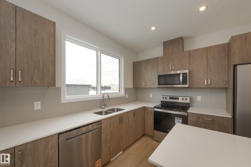 307 173 Avenue, Edmonton, AB - Indoor Photo Showing Kitchen With Double Sink