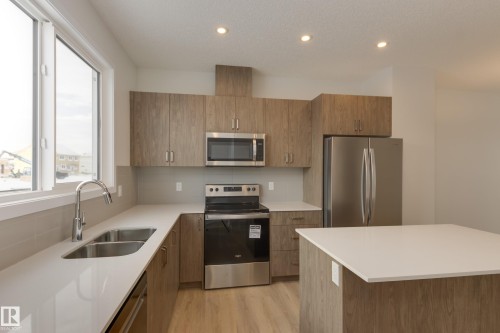 307 173 Avenue, Edmonton, AB - Indoor Photo Showing Kitchen With Double Sink