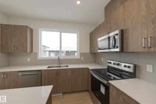 307 173 Avenue, Edmonton, AB - Indoor Photo Showing Kitchen With Double Sink