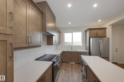 21276 131 Avenue, Edmonton, AB - Indoor Photo Showing Kitchen With Stainless Steel Kitchen With Upgraded Kitchen
